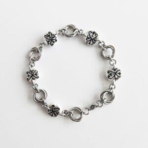 Iridescent victorian gothic and mobius rose silver charm bracelet